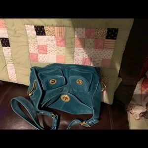 Nice suede turquoise shoulder bag!